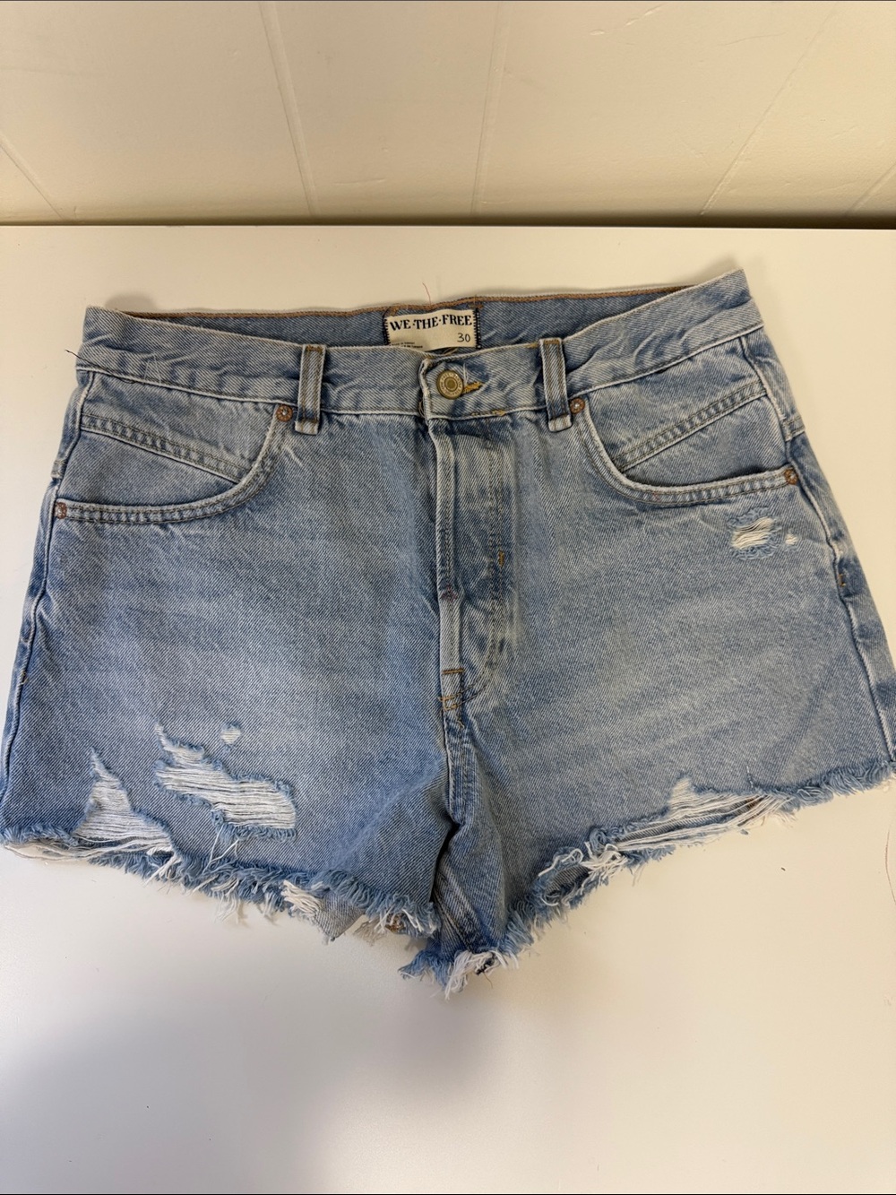 We The Free Faded Light Blue Distressed Denim Cutoff Shorts